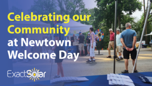 photo from behind a table at a street fair with the text "Celebrating our Community at Newtown Welcome Day"