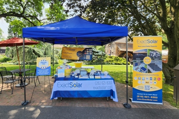 Exact Solar's booth at the 2023 Bluegrass and Blueberries Festival at Peddler's Village in Lahaska, Pennsylvania
