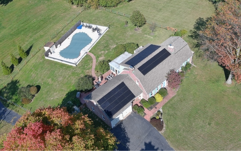 Aerial view of a roof-mounted residential solar system installed by Exact Solar