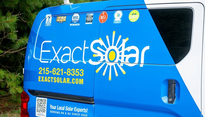 A close up photo of Exact Solar's company van used for solar installations