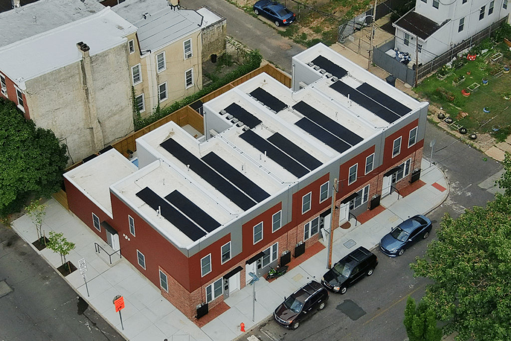 a building with solar panels on the roof