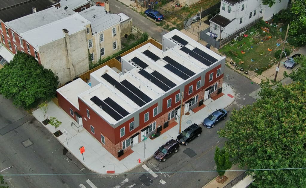 An aerial view of solar panels on the roof of the Coltrane Commons development in Philadelphia's Strawberry Mansion.