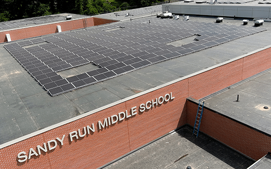 Rooftop solar installation on Sandy Run Middle School