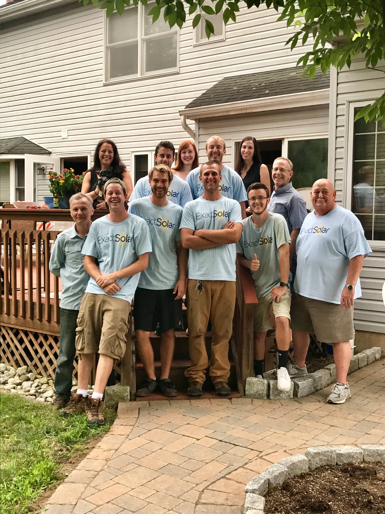A group photo of Exact Solar's team in 2018.