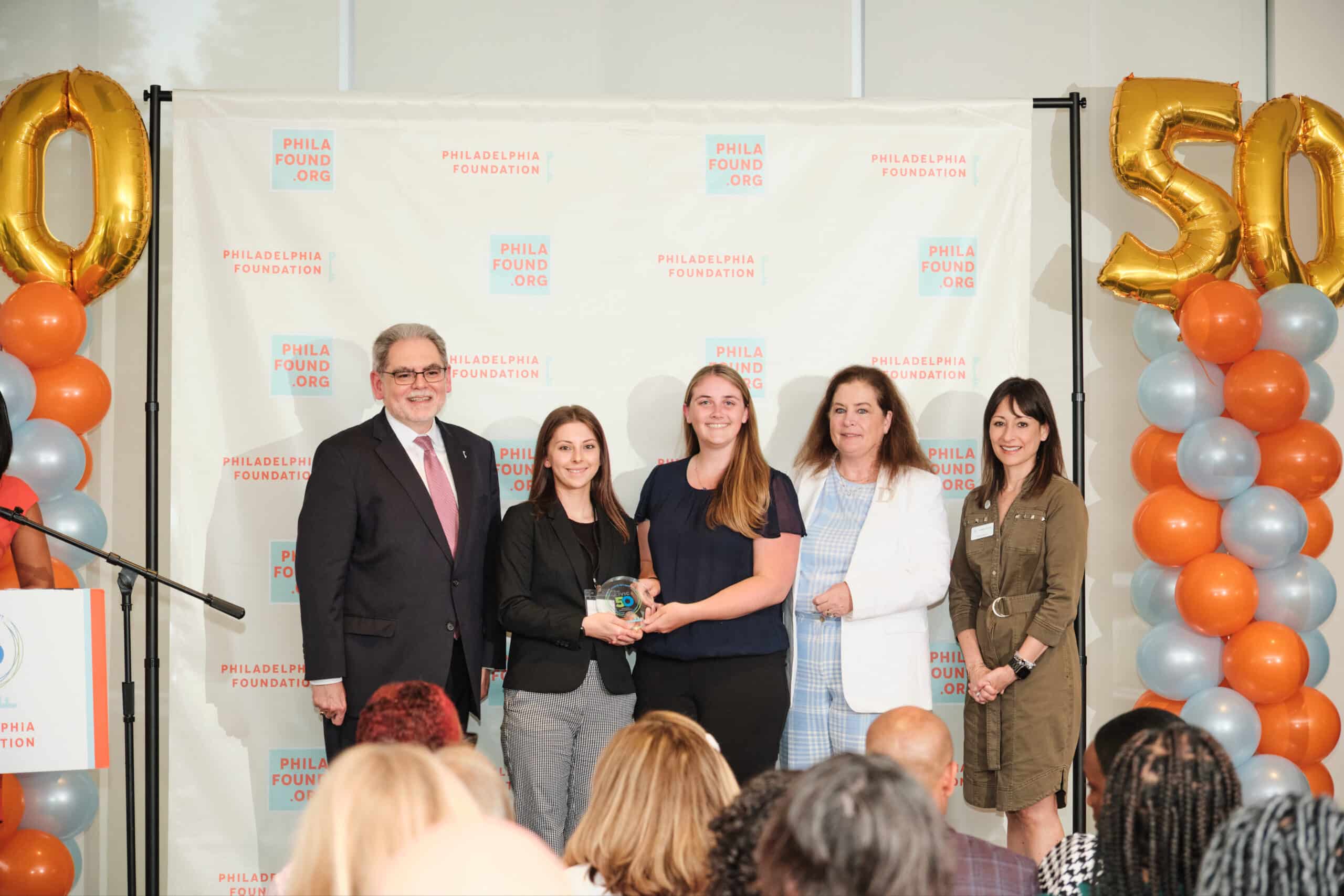 Exact Solar's team accepting their Civic 50 Award.
