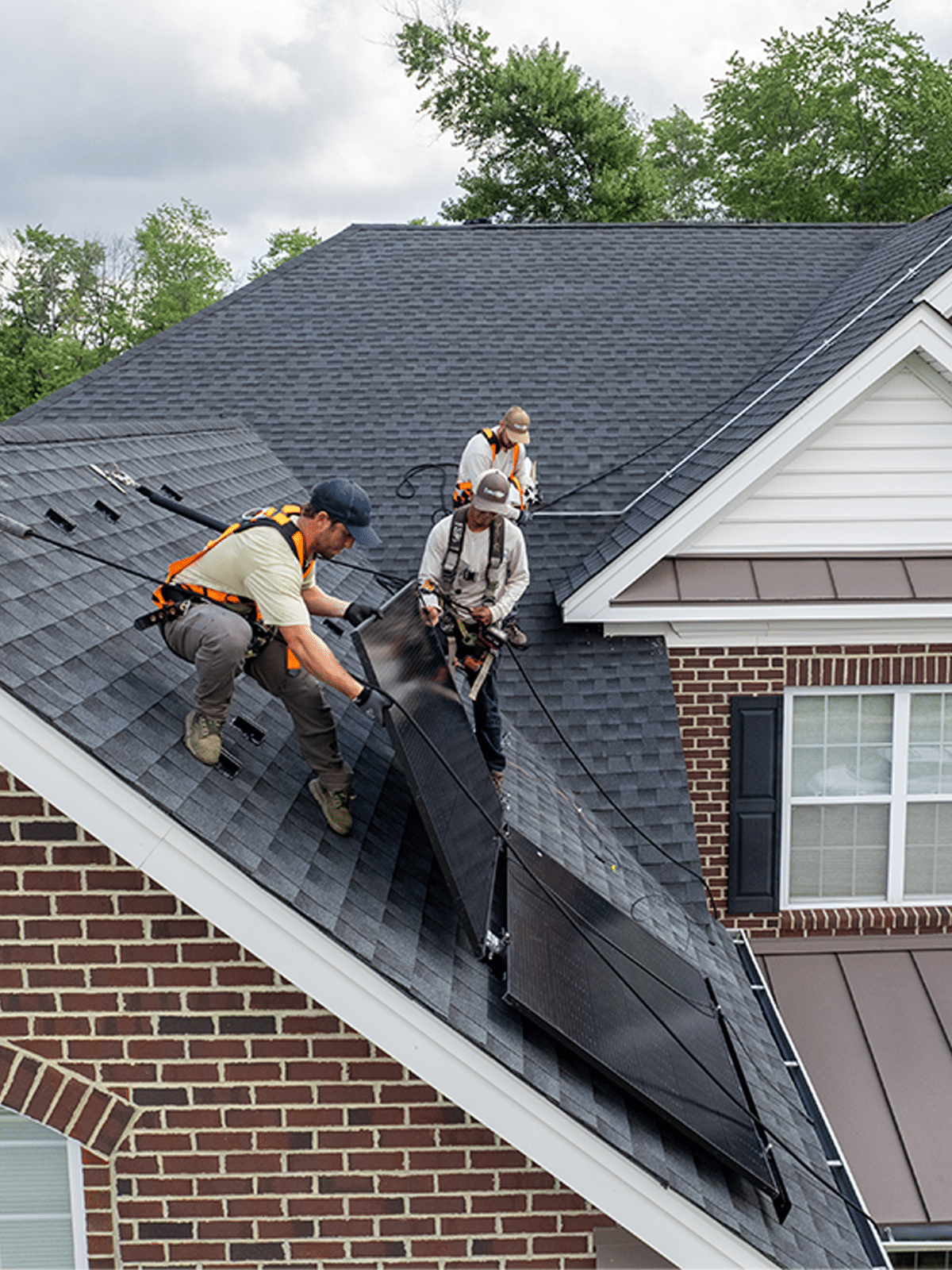 Photo of Exact Solar installation team on a roof
