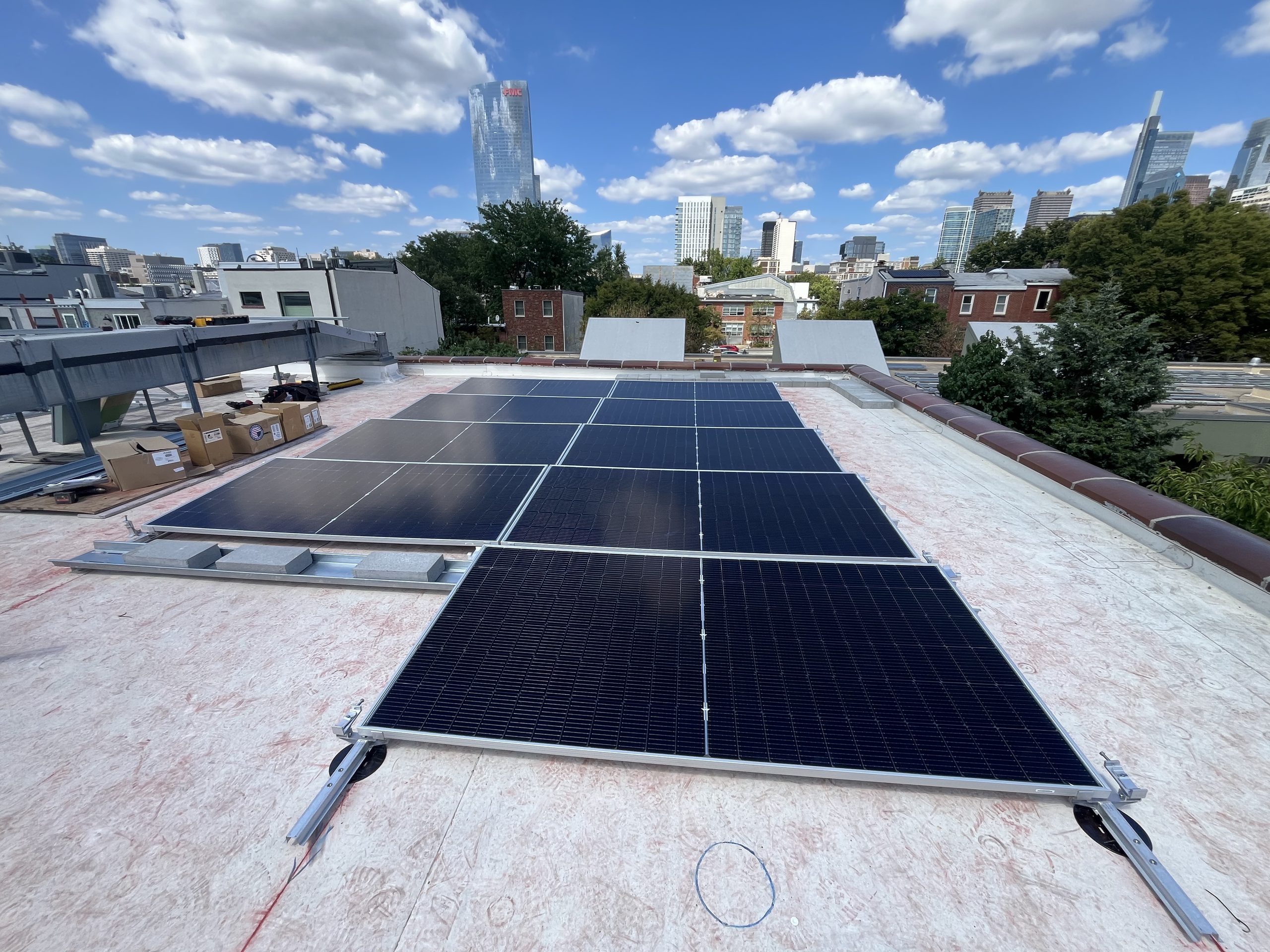 An in-progress picture of our installation at TPS with the Philadelphia skyline in the background.