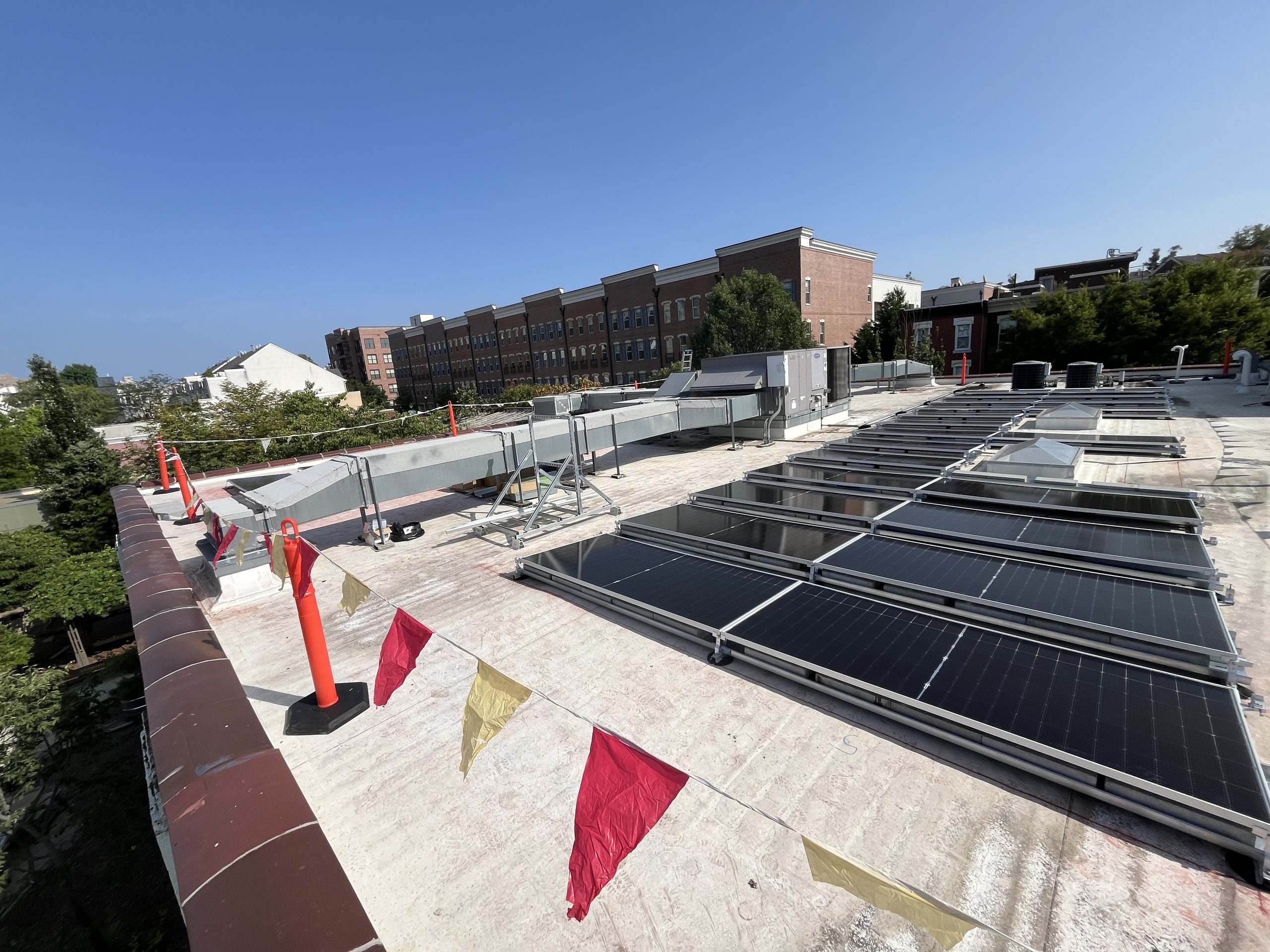 Installation work on The Philadelphia School’s rooftop solar system
