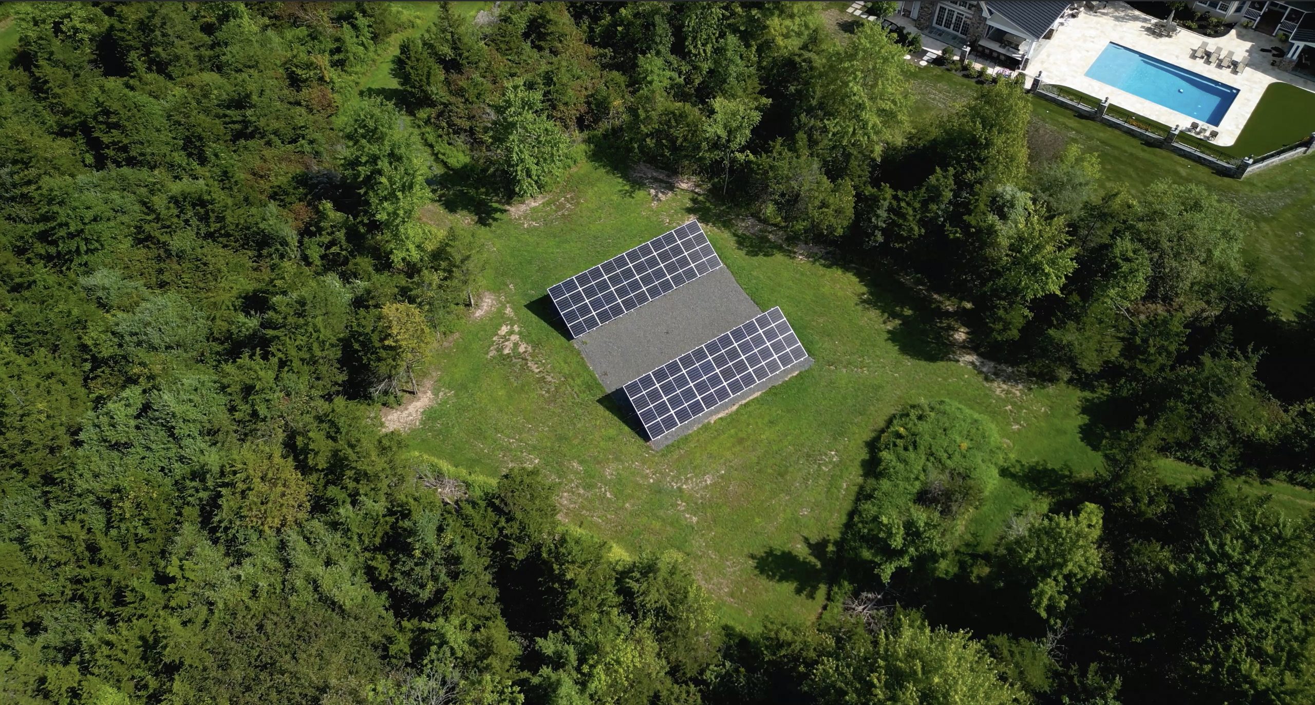 A ground-mounted residential solar system installed by Exact Solar.